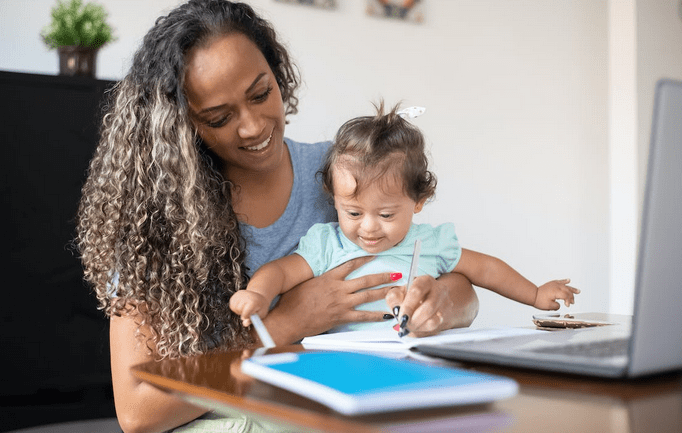 nursing mother doing internet business ideas for stay at home moms